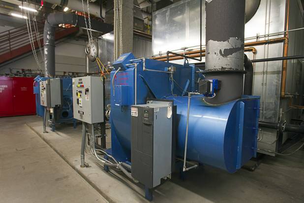 Natural gas boilers are shown during a tour of CityCenters sustainable features and cogeneration plant Monday, Aug. 12, 2013.