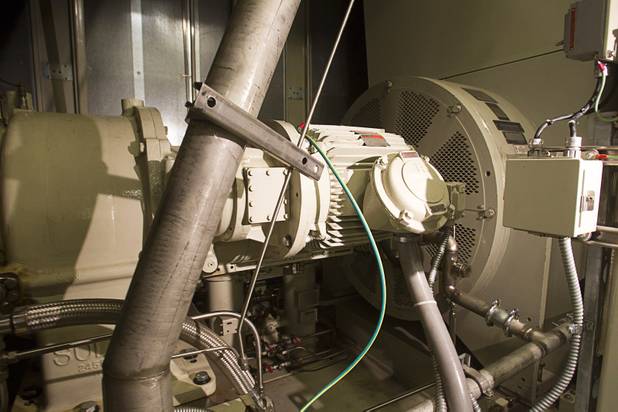 A natural gas turbine for generating electricity is shown during a tour of CityCenters sustainable features and cogeneration plant Monday, Aug. 12, 2013. Waste heat from the process is re-used to heat water for the property.