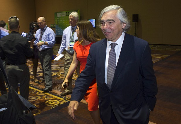 U.S. Secretary of Energy Ernest Moniz leaves the press room after answering question from reporters about nuclear waste disposal during the National Clean Energy Summit 6.0 at the Mandalay Bay Tuesday, Aug. 13, 2013.