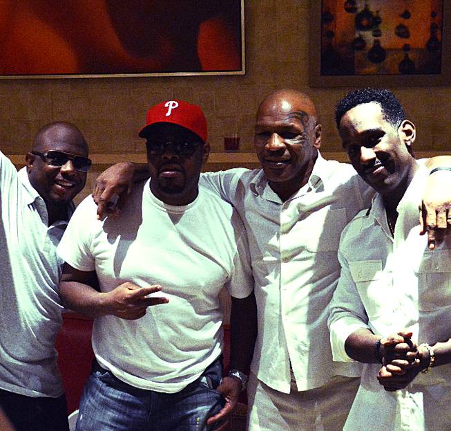 Mike Tyson, second from right, with Mirage headliners Boyz II Men at the Mirage.
