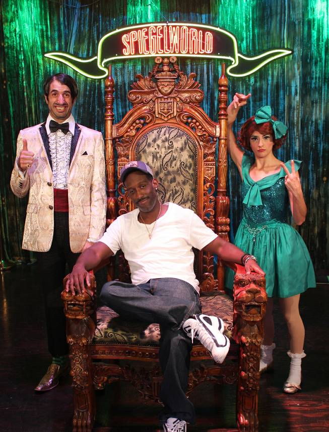 Shawn Stockman of Boyz II Men is flanked by "Absinthe" stars The Gazillionaire and Penny Pibbets at Caesars Palace on Thursday, Aug. 8, 2013.