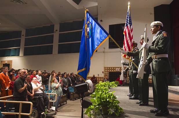 The Cheyenne High School ROTC color guard presents the colors during the Clark County School District's second annual summer high school graduation ceremony for summer school graduates and at-risk students at the Las Vegas Academy in downtown Las Vegas Wednesday, Aug. 14, 2013.
