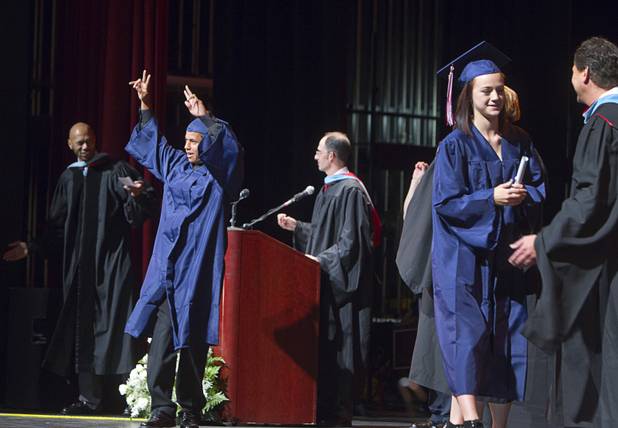 Graduates are called to the stage during the Clark County School District's second annual summer high school graduation ceremony for summer school graduates and at-risk students at the Las Vegas Academy in downtown Las Vegas Wednesday, Aug. 14, 2013.