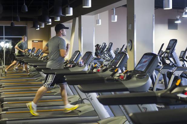 People run on treadmills at the new fitness center on Nellis Air Force Base Thursday, Aug. 15, 2013. The $25 million fitness facility is the result of a partnership between the City of North Las Vegas and the U.S. Air Force. The Air Force is leasing the city a parcel for the city's water treatment facility and the city paid the Air Force $25 million to build the new fitness center.