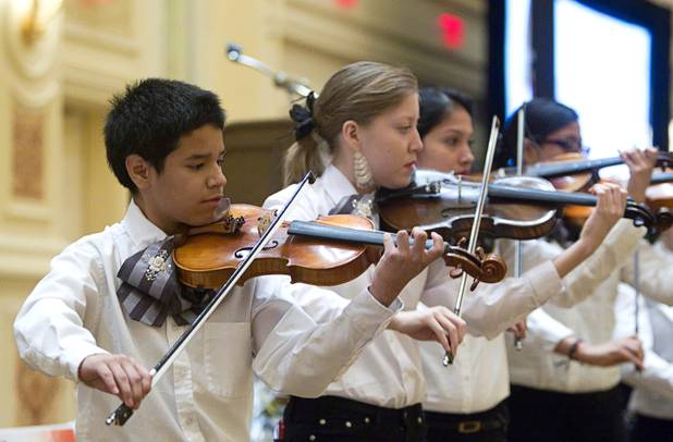 Bandon Rodriguez, left, 12, and other mariachis perform during a Clark County School District orientation session for new teachers at the Venetian Thursday, Aug. 15, 2013. Over 1,700 teachers took part in the orientation.