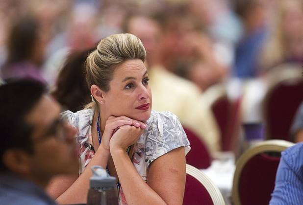 New teacher Colleen Venneman listens to Las Vegas Mayor Carolyn Goodman during a Clark County School District orientation session for new teachers at the Venetian Thursday, Aug. 15, 2013. Over 1,700 teachers took part in the orientation.
