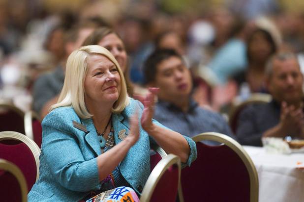 Lorraine Alderman, Clark County School Board trustee, applauds during a CCSD orientation session for new teachers at the Venetian Thursday, Aug. 15, 2013. Over 1,700 teachers took part in the orientation.