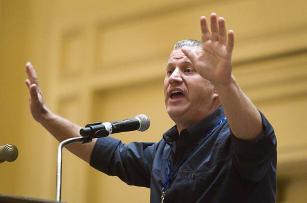 Scott Flansburg, Guinness World Record holder for fastest Human Calculator, gives a demonstration of his abilities during a Clark County School District orientation session for new teachers at the Venetian Thursday, Aug. 15, 2013. Over 1,700 teachers took part in the orientation.