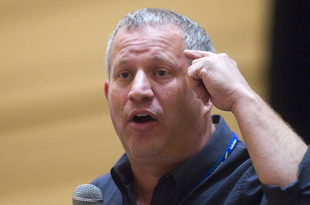 Scott Flansburg, Guinness World Record holder for fastest Human Calculator, gives a demonstration of his abilities during a Clark County School District orientation session for new teachers at the Venetian Thursday, Aug. 15, 2013. Over 1,700 teachers took part in the orientation.