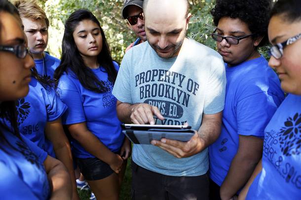 Christopher Bache, center, leads campers in filming a public service announcement about bullying at Camp Heart and Sole at Torino Ranch in Lovell Canyon on Saturday, August 17, 2013.