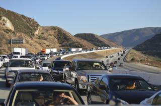 A fire on the Cajon Pass on Sunday afternoon blocked traffic on Interstate 15 for more than an hour. It was part of a busy afternoon. A wreck caused miles of congestion in Baker earlier in the day.
