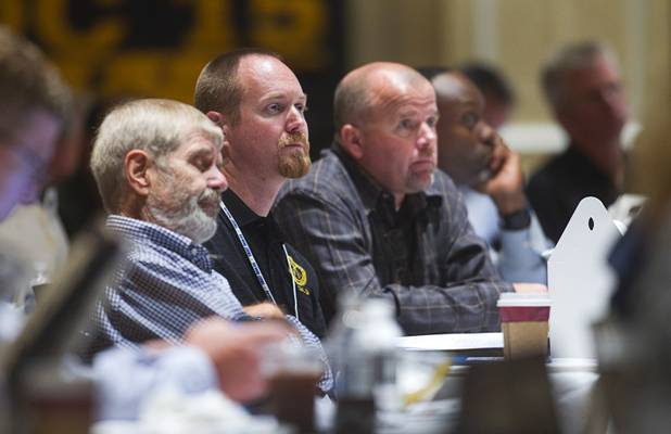 Union members listen to a panel discussion during the Nevada State AFL-CIO convention at the Excalibur Tuesday, Aug. 20, 2013.