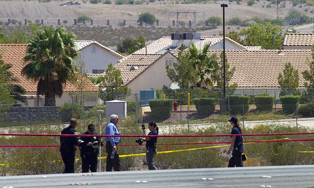 Henderson Police investigate an officer-involved shooting near Boulder Highway and College Drive in Henderson, Aug. 20, 2013. STEVE MARCUS