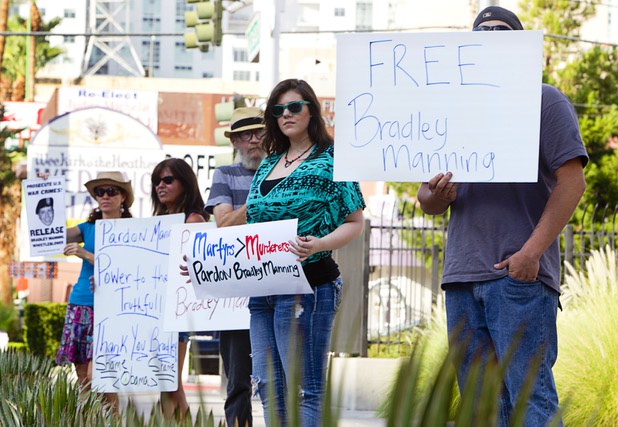 About 15 people picket in support of Army Pfc. Bradley Manning at the Lloyd George Federal Building in downtown Las Vegas Wednesday, Aug. 21, 2013. A military judge sentenced Manning to 35 years in prison for leaking hundreds of thousands of classified documents to WikiLeaks.
