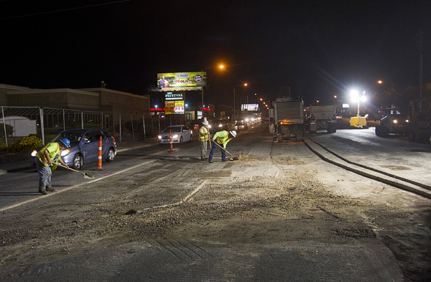 Harber Company employees work on a repaving project on Decatur Blvd. near Flamingo Road Thursday, Aug. 22, 2013.