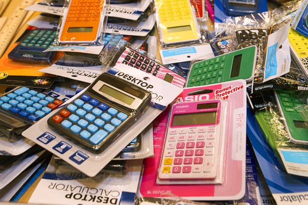 Calculators are piled on a table during MGM Resorts' annual Educator Appreciation Day and Back to School Fair at the Mirage Thursday, Aug. 22, 2013. More than 18,000 teachers were invited to gather schools supplies donated by MGM Resorts employees.