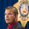Two Arrested in Alleged Plot To Kill Officer