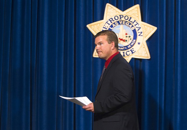 Metro Lt. James Seebock of the Counter Terrorism Section leaves a news conference at Metro Police headquarters Thursday, Aug. 22, 2013. Seebock answered questions regarding the arrests of David Brutsche and Devon Newman who are accused of conspiring to kidnap and murder a local police officer.