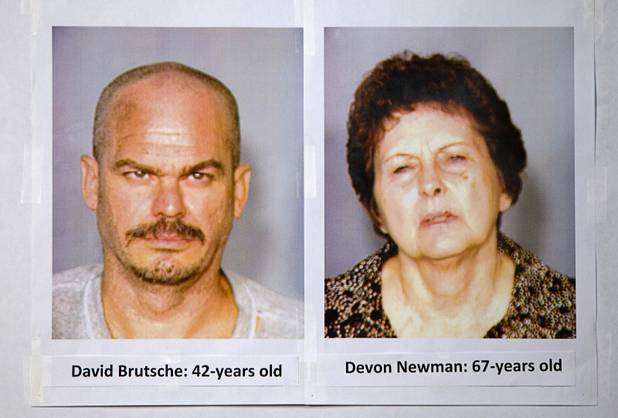 Booking photos of David Brutsche and Devon Newman are displayed during a news conference at Metro Police headquarters Thursday, Aug. 22, 2013. Brutsche and Newman are accused of conspiring to kidnap and murder a local police officer.