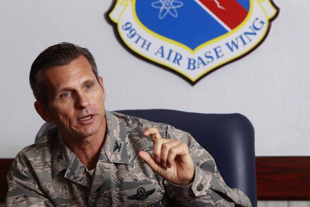 Colonel Barry Cornish, commander of the 99th Air Base Wing, responds to a question during a interview at Nellis Air Force Base Monday, Aug. 26, 2013.