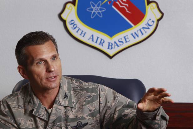 Colonel Barry Cornish, commander of the 99th Air Base Wing, responds to a question during a interview at Nellis Air Force Base Monday, Aug. 26, 2013.