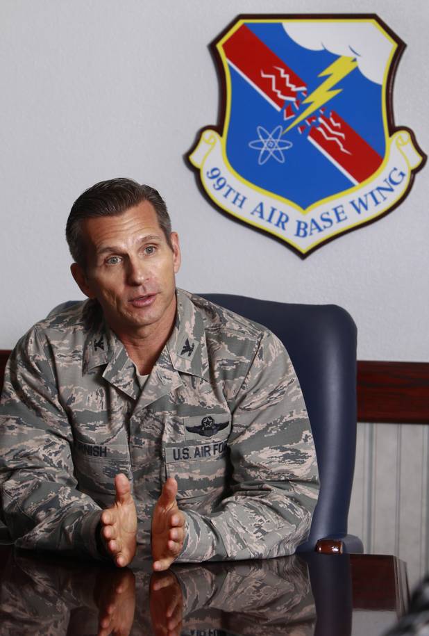 Colonel Barry Cornish, commander of the 99th Air Base Wing, responds to a question during a interview at Nellis Air Force Base Monday, Aug. 26, 2013.