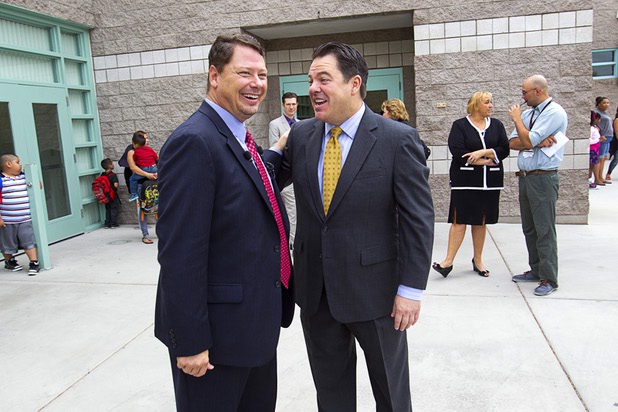 Clark County School District Superintendent Pat Skorkowsky, left, greets State Sen. Michael Roberson during the first day of school at Cambeiro Elementary School Monday, Aug. 26, 2013. The school is a "Zoom" school, one of 14 CCSD schools that will receive additional state money and resources to help students who don't speak English.