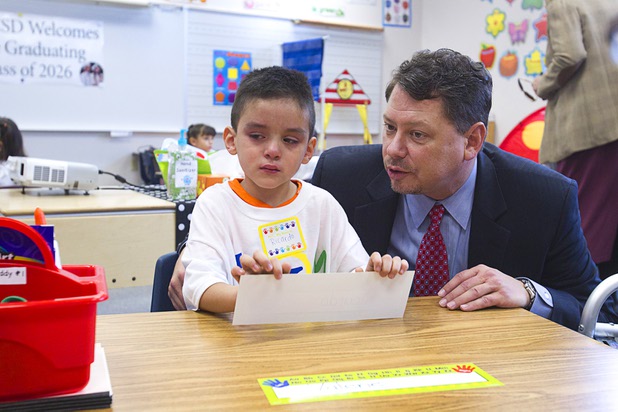 Clark County School District Superintendent Pat Skorkowsky visits with a kindergarten student during the first day of school at Cambeiro Elementary School Monday, Aug. 26, 2013. The school is a "Zoom" school, one of 14 CCSD schools that will receive additional state money and resources to help students who don't speak English.
