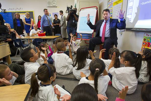 Clark County School District Superintendent Pat Skorkowsky teaches a game to kindergarten students during the first day of school at Cambeiro Elementary School in 2013. It's a "Zoom" school that receives additional state money and resources to help students who don't speak English, and a weighted funding formula just introduced in the Legislature would expand such support to qualifying students at all public schools.
