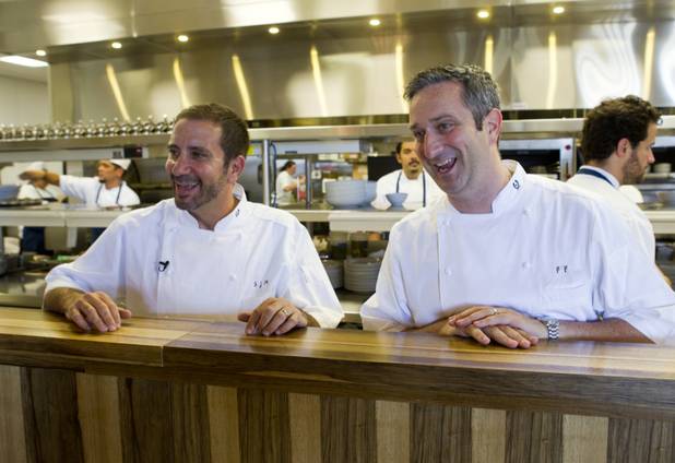 Chefs Sam Marvin and Frank Fronda stand in front of the kitchen at the new Echo & Rig Butcher and Steakhouse, 440 S. Rampart Blvd., at Tivoli Village on Tuesday, Aug. 27, 2013. The restaurant's kitchen is open to the dining area.