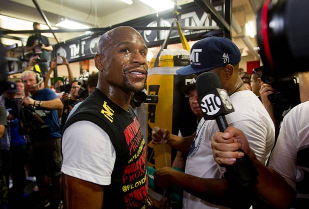 Undefeated boxer Floyd Mayweather Jr. is shown during a workout at the Mayweather Boxing Club Wednesday, August 28, 2013. Mayweather will face Canelo Alvarez of Mexico in a WBC/WBA 154-pound title fight at the MGM Grand Garden Arena on September 14.