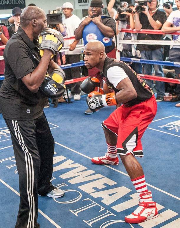 Undefeated boxer Floyd Mayweather Jr. hosts a workout for media at Mayweather Boxing Club in Las Vegas on Wednesday, Aug. 28, 2013.