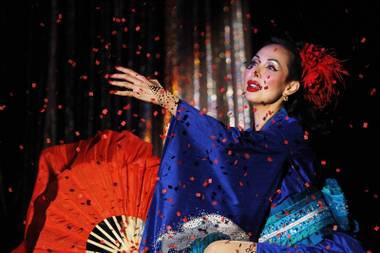 Kalani Kokonuts performs during a benefit show in honor of burlesque pioneer Dixie Evans on Saturday, Aug. 31, 2013, at the Plaza.