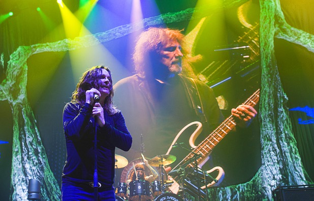 Black Sabbath's Ozzy Osbourne performs at MGM Grand Garden Arena on Sunday, Sept. 1, 2013. A live projected image of bassist Geezer Butler is in the background.