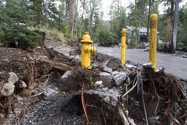 Flood damage is shown in the Rainbow Canyon subdivision on Mount Charleston Sunday, Sept. 1, 2013.