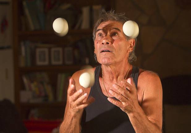 Nino Frediani, 73, juggles balls at his home Tuesday, Sept. 3, 2013. Frediani has performed as a professional juggler in Las Vegas for more than 30 years but few people knew that he is legally blind.