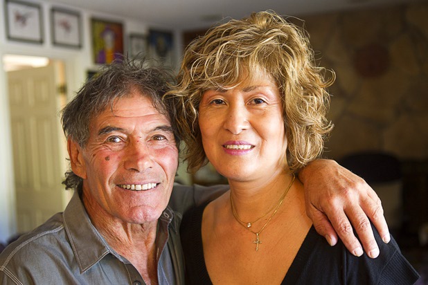 Nino Frediani, 73, poses with his wife Kinuko in their home Tuesday, Sept. 3, 2013. Frediani has performed as a professional juggler in Las Vegas for more than 30 years but few people knew that he is legally blind.