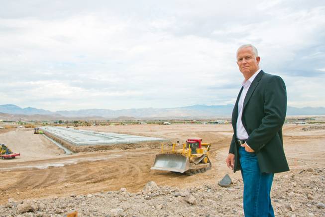 Dan Doherty, Senior VP of Colliers International, stands overlooking the site of a future FedEx facility, Friday Aug, 30, 2013.