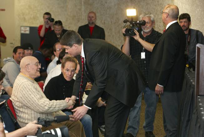 Jerry Tarkanian, left, and Dave Rice, right, during a media conference and welcome reception for Rice, the newly named UNLV Runnin' Rebels head basketball coach on April 11, 2011.    


