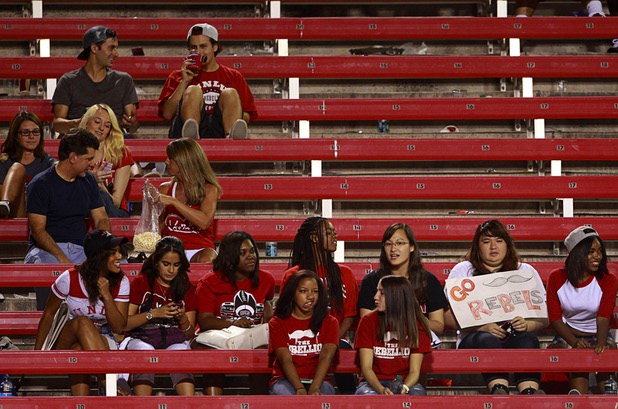 A few die-hard UNLV fans stayed until the end during UNLV's home opener against the University of Arizona at Sam Boyd Stadium Saturday, Sept. 7, 2013.