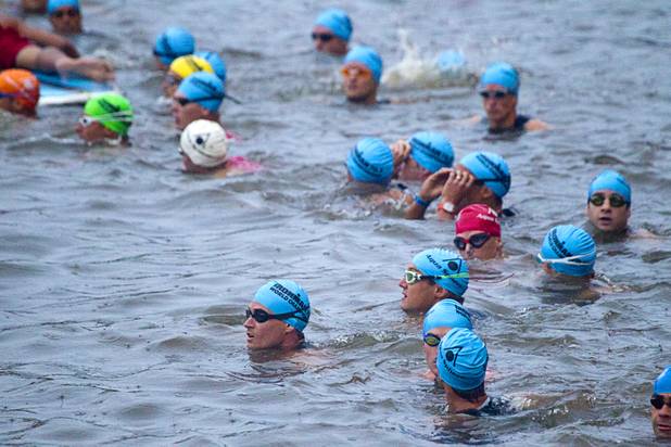 Athletes in the Po-Men division wait for the start of the Ironman 70.3 World Championship at Lake Las Vegas in Henderson Sunday, Sept. 8, 2013. More than 1,800 athletes from around the U.S. and 53 countries qualified for the event.
