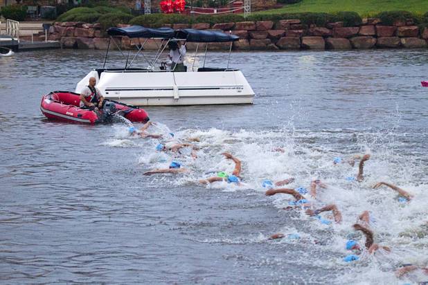 Athletes in the Po-Men division start their 1.2-mile swim during the Ironman 70.3 World Championship at Lake Las Vegas in Henderson Sunday, Sept. 8, 2013. More than 1,800 athletes from around the U.S. and 53 countries qualified for the event.