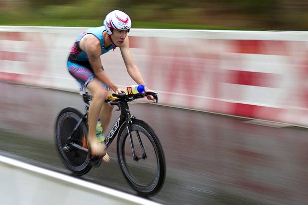 Christopher Baird of Boston, Mass. begins on a 56-mile ride during the Ironman 70.3 World Championship at Lake Las Vegas in Henderson Sunday, Sept. 8, 2013. More than 1,800 athletes from around the U.S. and 53 countries qualified for the event.