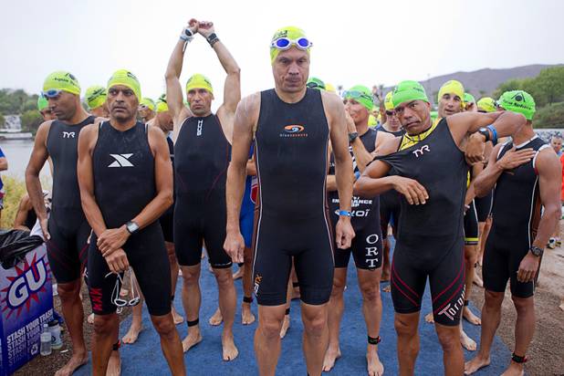 Men in the 40 to 44-year-old division prepare to start their swim during the Ironman 70.3 World Championship at Lake Las Vegas in Henderson Sunday, Sept. 8, 2013. More than 1,800 athletes from around the U.S. and 53 countries qualified for the event.
