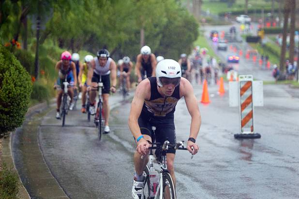David Kinshott of England rides uphill from Lake Las Vegas during the Ironman 70.3 World Championship in Henderson Sunday, Sept. 8, 2013. More than 1,800 athletes from around the U.S. and 53 countries qualified for the event.