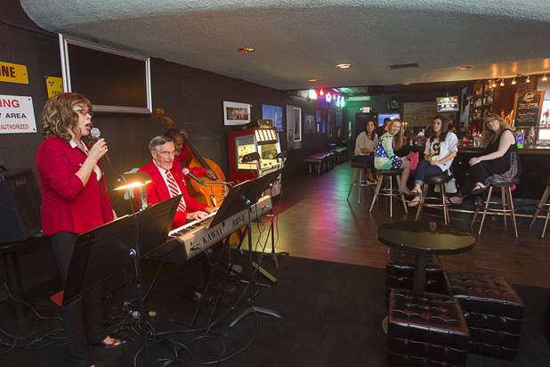 Members of the "Jazz Ecclesiasticus" perform during an inaugural pub church service at the Atomic, 917 East Fremont Street, in downtown Las Vegas Sunday, Sept. 8, 2013. From left are: Marchand Melcher, James Geffert, and Norm Ross.