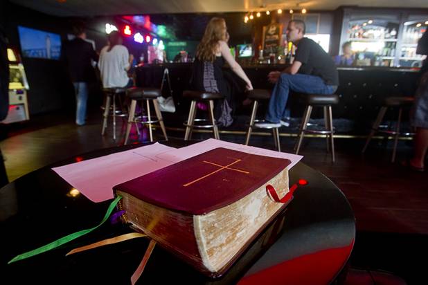 A Bible is shown on a table at the Atomic, 917 East Fremont St., after an inaugural pub church service in the bar Sunday, Sept. 8, 2013, in downtown Las Vegas.