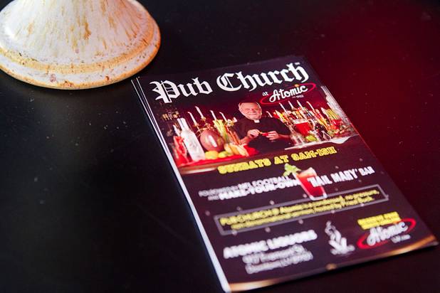 Fliers advertise a Sunday pub church service at the Atomic, 917 East Fremont Street, in downtown Las Vegas Sunday, Sept. 8, 2013.