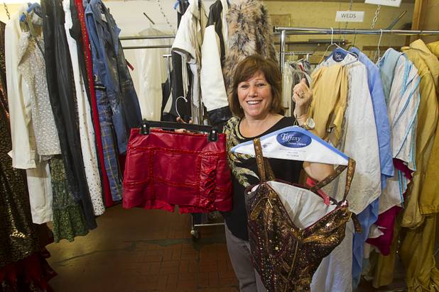 Owner Judy Del Rossi poses with costumes from Rock of Ages at Tiffany Cleaners in the Commercial Center Monday, Sept. 9, 2013. In addition to serving their normal dry cleaning customers, the shop also provides dry cleaning for most of the shows on the Las Vegas Strip.