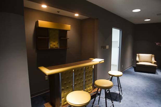 A bar has been installed in the back room behind the old city council chambers at the Zappos headquarters in the old city hall building downtown Monday, Sept. 9, 2013. The downtown headquarters officially opened Monday.
